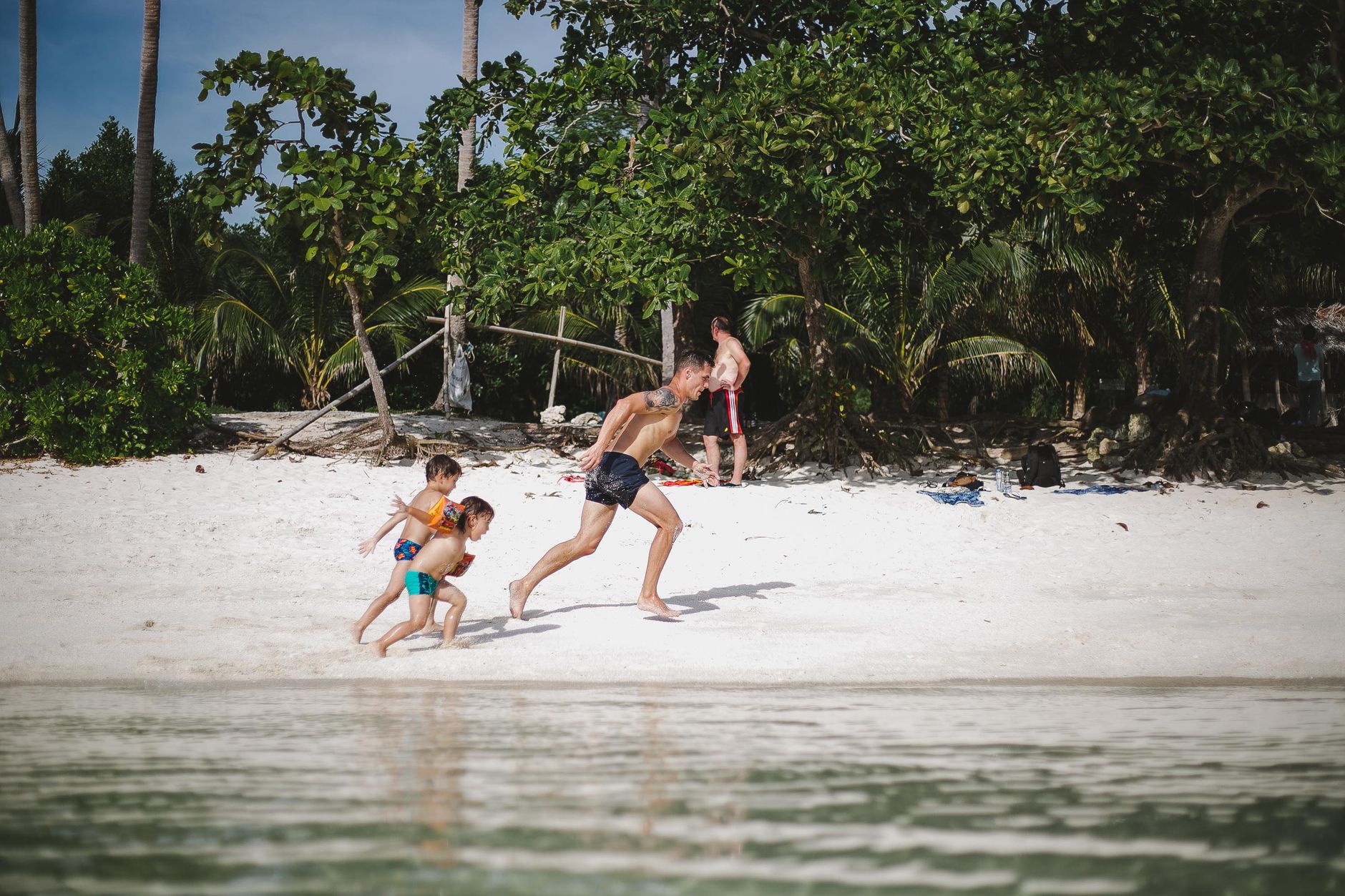 Family having fun on beach